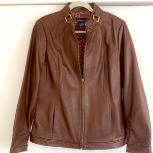 Woman’s 100% brown leather jacket, size XL.